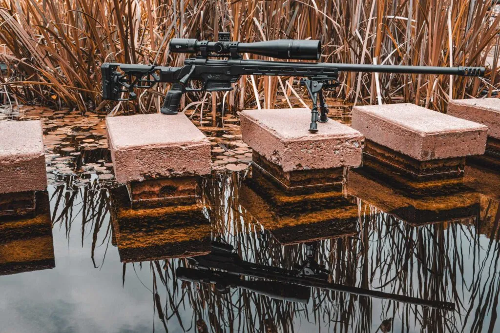 rifle shooting in a pond